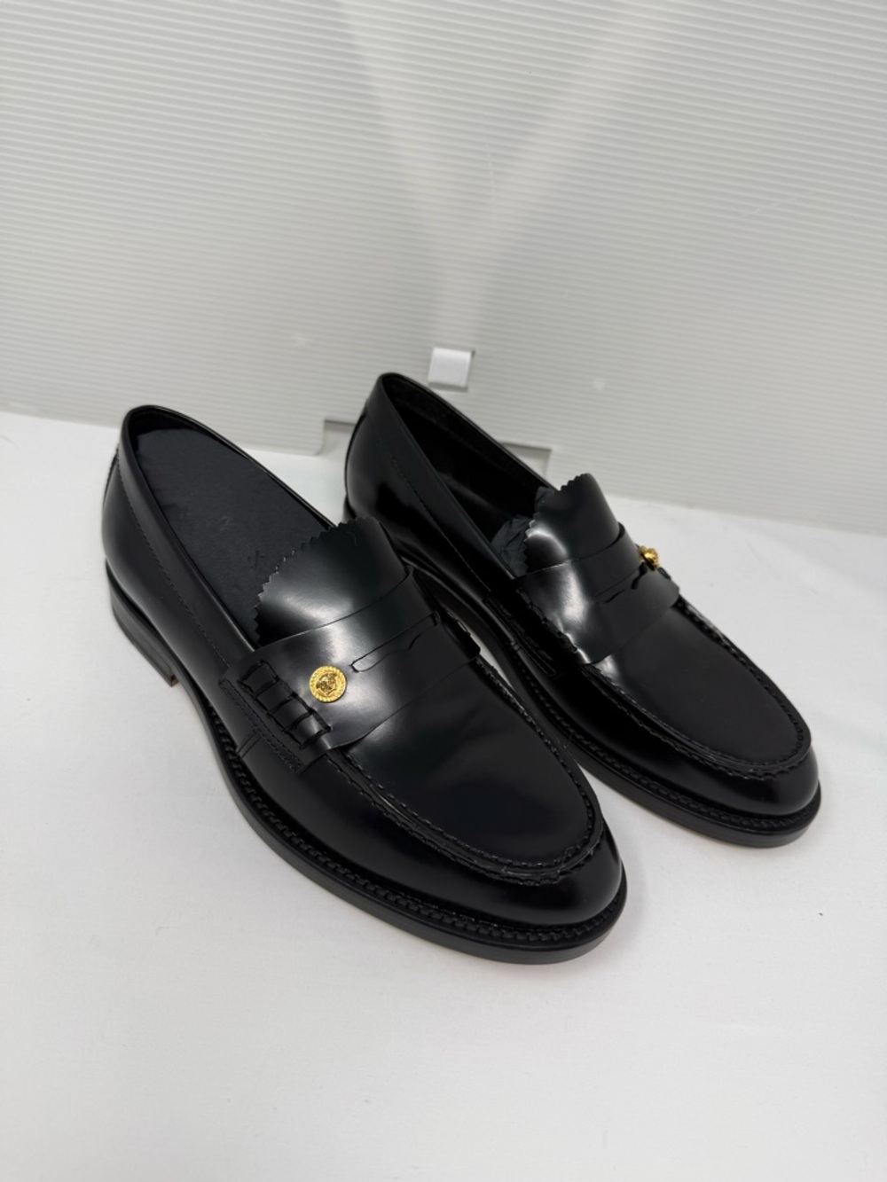 Versace Black Leather Penny Loafers with Gold Medallion